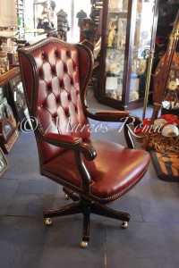 poltrona girevole in pelle